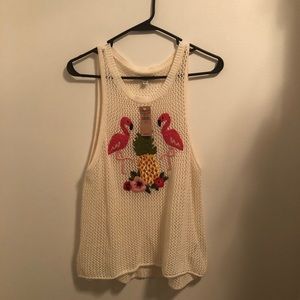 Crochet flamingo tank.